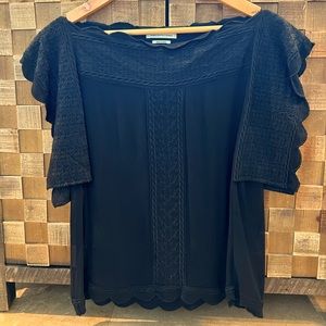 Isabel Marant black sheer short sleeved top.